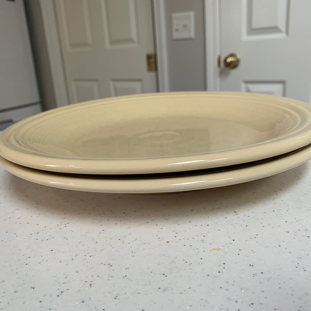 Two Fiesta Ivory Dinner Plates